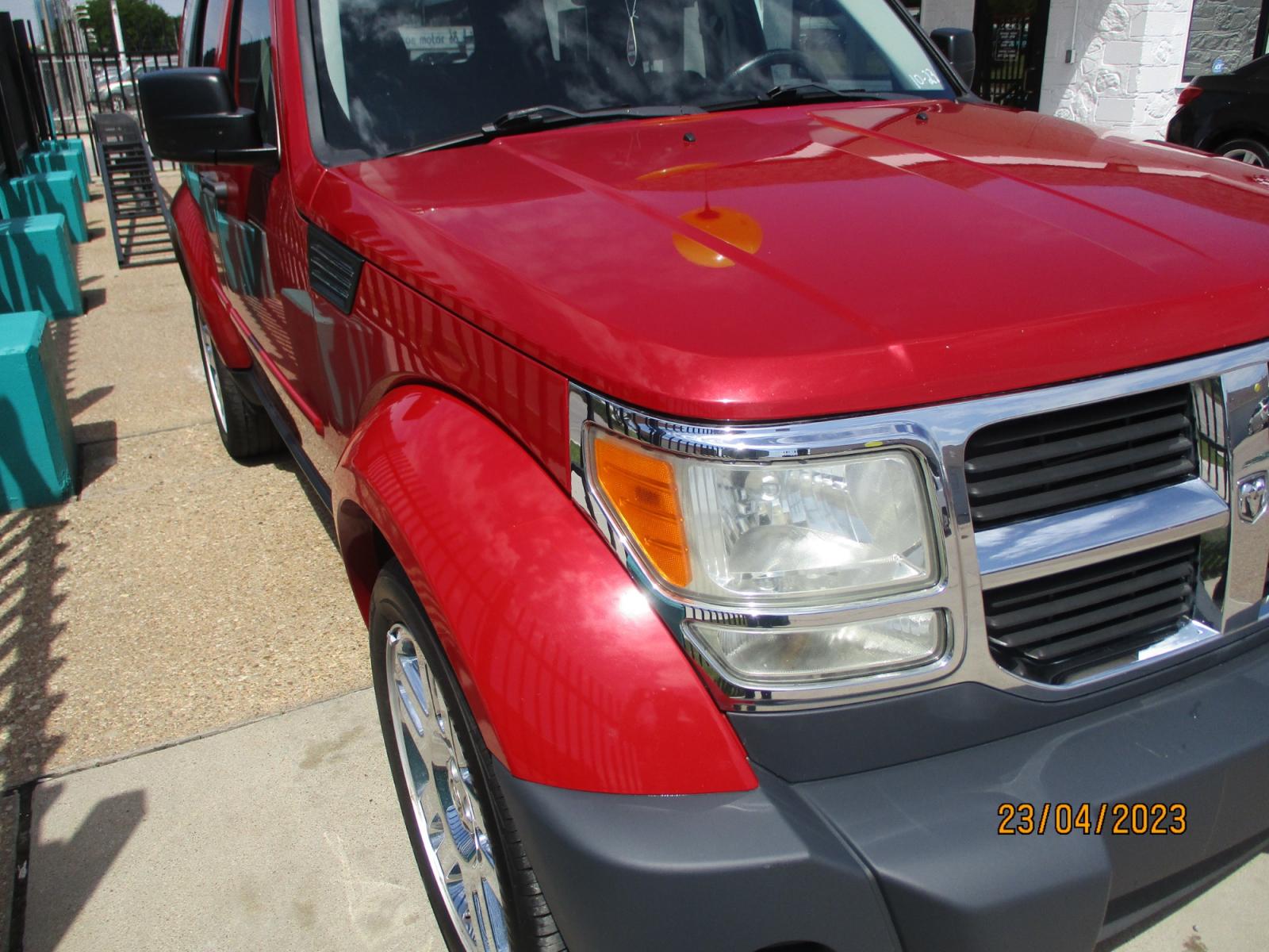 2011 RED Dodge Nitro Heat 4WD (1D4PU4GX0BW) with an 4.0L V6 SOHC 24V engine, 5-Speed Automatic transmission, located at 2001 E. Lancaster, Ft. Worth, 76103, (817) 336-7000, 32.746181, -97.301018 - Photo #2