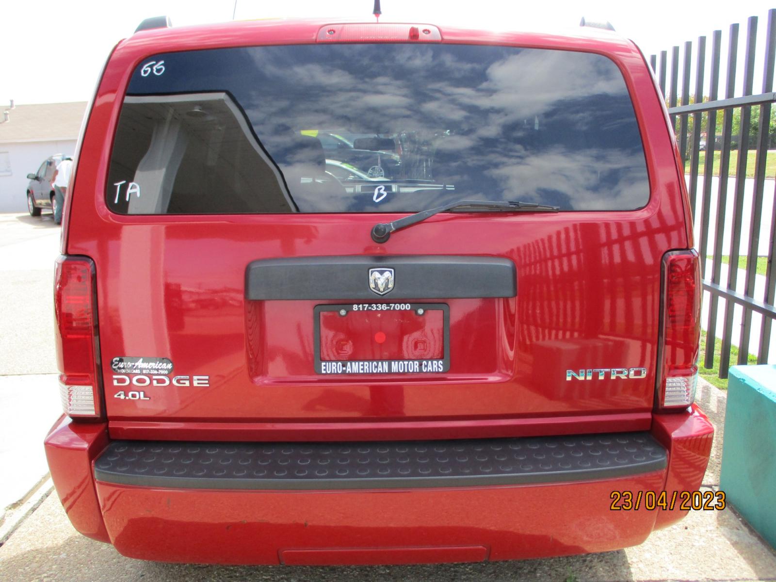 2011 RED Dodge Nitro Heat 4WD (1D4PU4GX0BW) with an 4.0L V6 SOHC 24V engine, 5-Speed Automatic transmission, located at 2001 E. Lancaster, Ft. Worth, 76103, (817) 336-7000, 32.746181, -97.301018 - Photo #6
