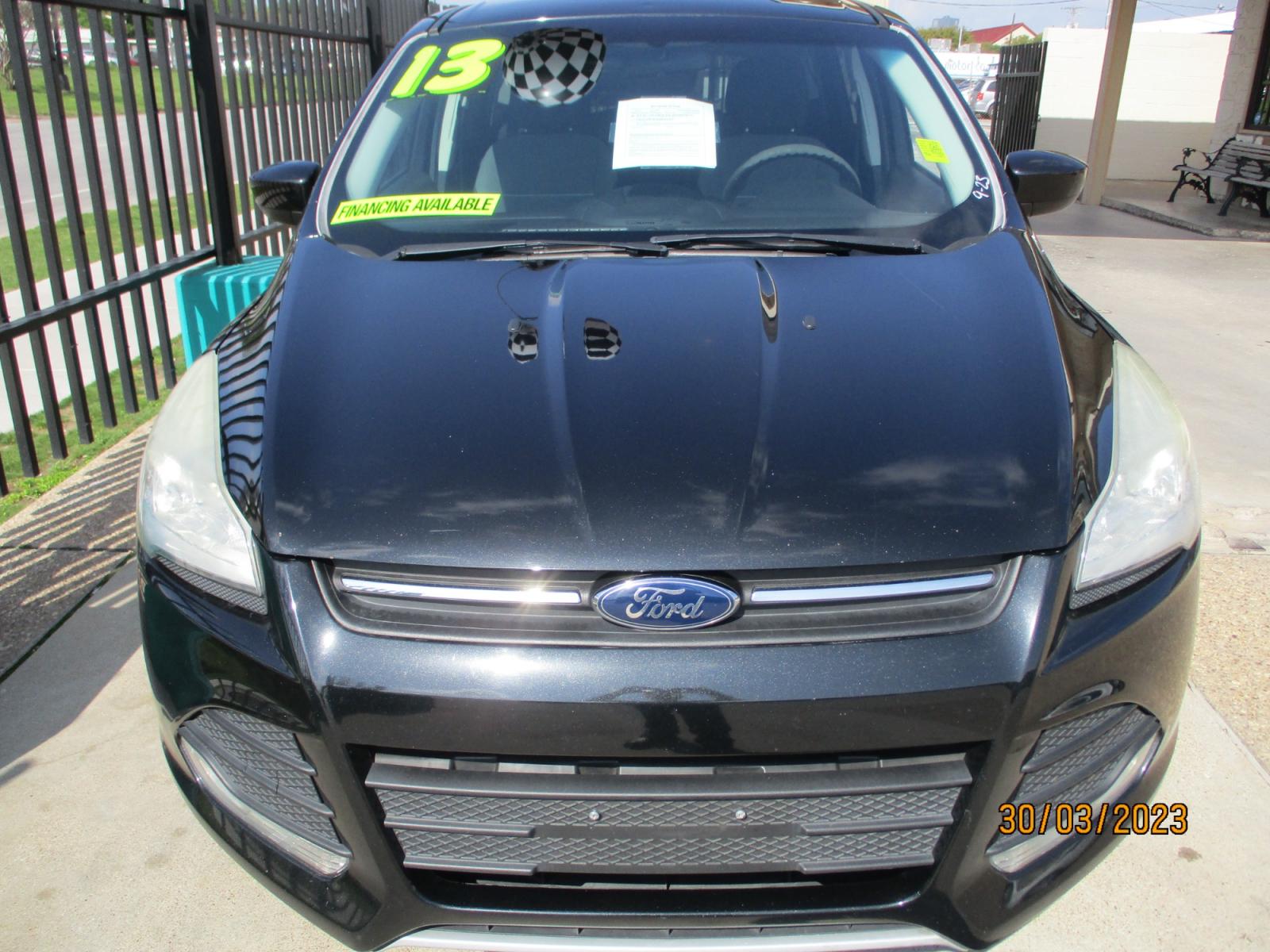 2013 Ford Escape SE AWD (1FMCU9GXXDU) with an 1.6L L4 DOHC 16V engine, 6-Speed Automatic transmission, located at 2001 E. Lancaster, Ft. Worth, 76103, (817) 336-7000, 32.746181, -97.301018 - Photo #3