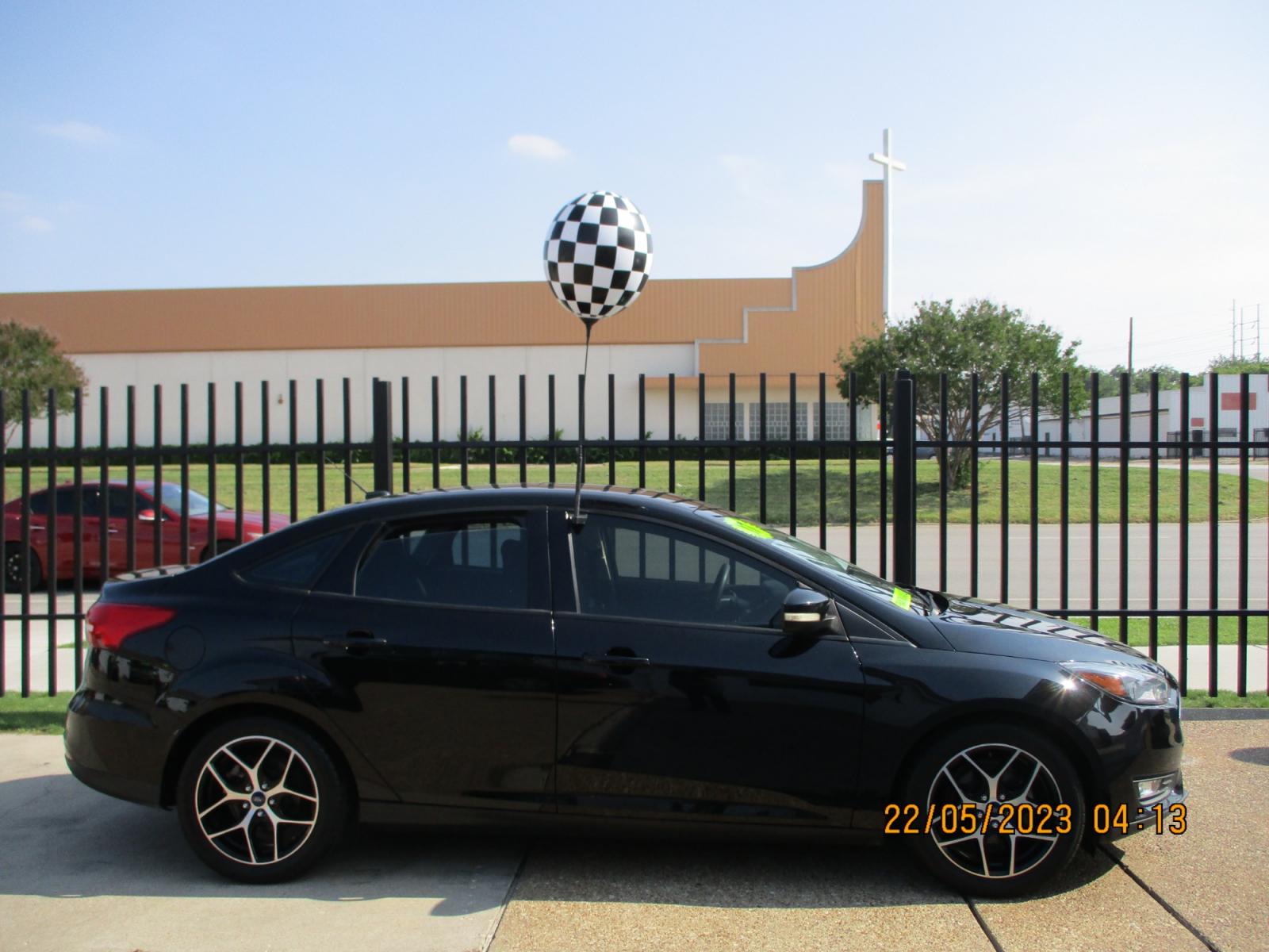 2017 Ford Focus SEL Sedan (1FADP3H25HL) with an 2.0L L4 DOHC 16V engine, 6-Speed Auto shift manual w/OD transmission, located at 2001 E. Lancaster, Ft. Worth, 76103, (817) 336-7000, 32.746181, -97.301018 - Photo #1