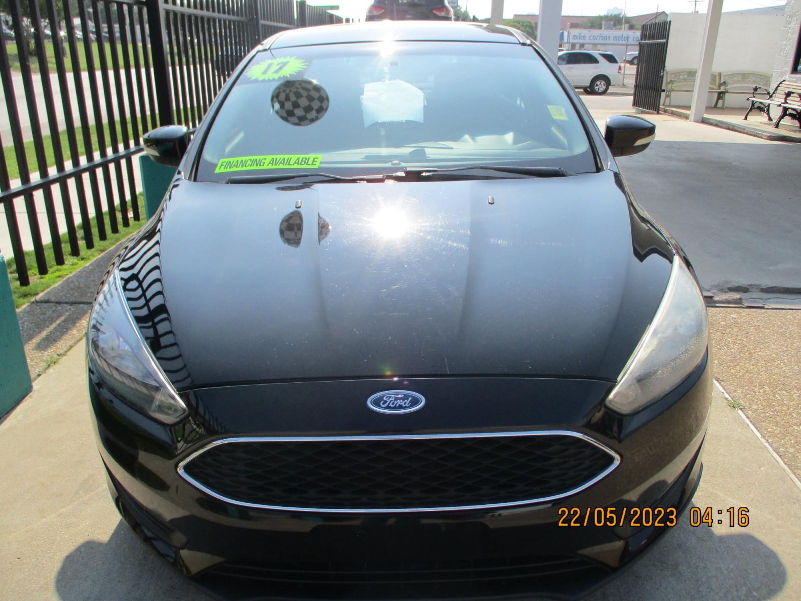 2017 Ford Focus SEL Sedan (1FADP3H25HL) with an 2.0L L4 DOHC 16V engine, 6-Speed Auto shift manual w/OD transmission, located at 2001 E. Lancaster, Ft. Worth, 76103, (817) 336-7000, 32.746181, -97.301018 - Photo #1