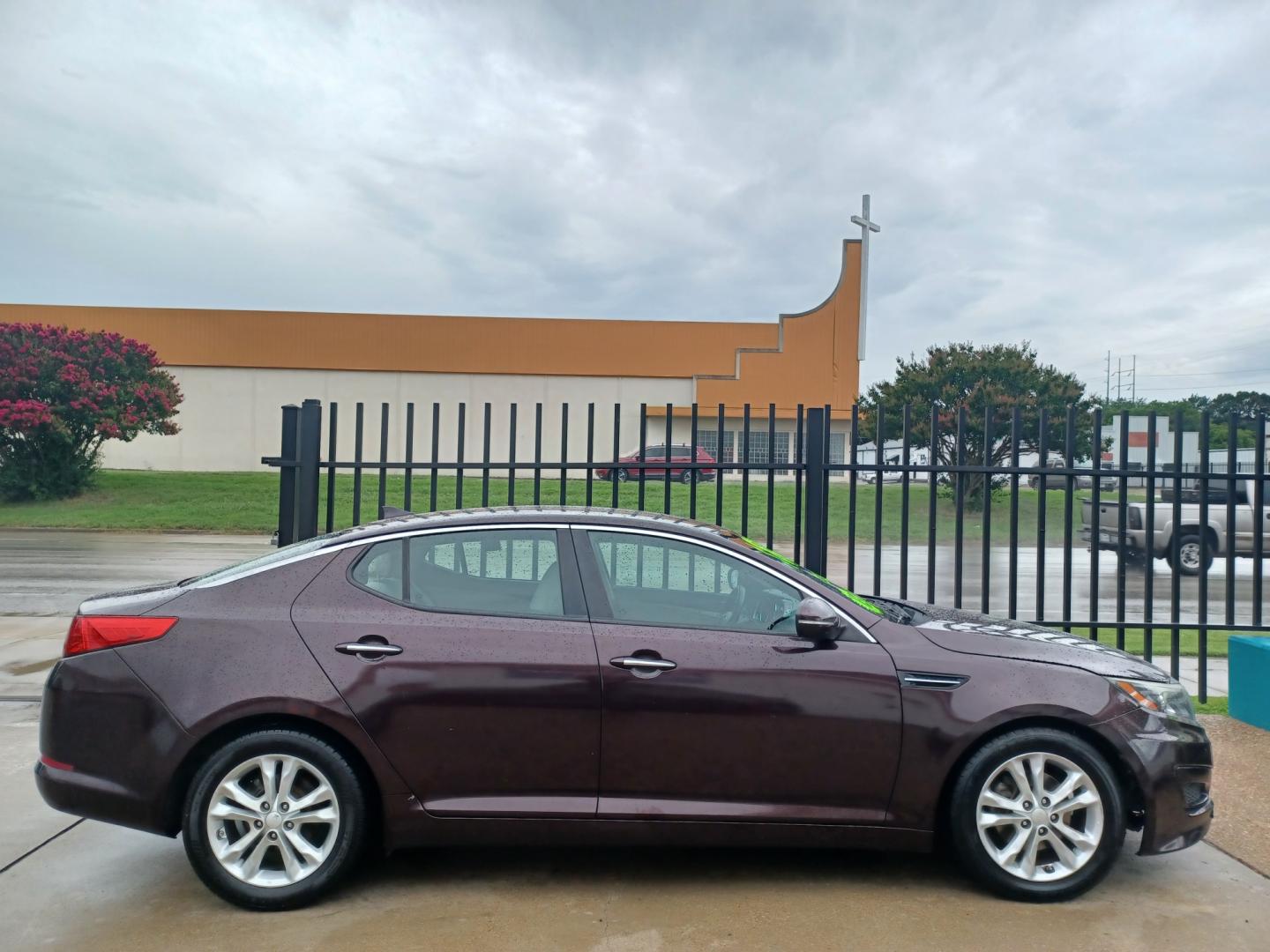 2013 MAROON Kia Optima LX MT (5XXGM4A72DG) with an 2.4L L4 DOHC 16V engine, 5-Speed Manual transmission, located at 2001 E. Lancaster, Ft. Worth, 76103, (817) 336-7000, 32.746181, -97.301018 - Photo#1