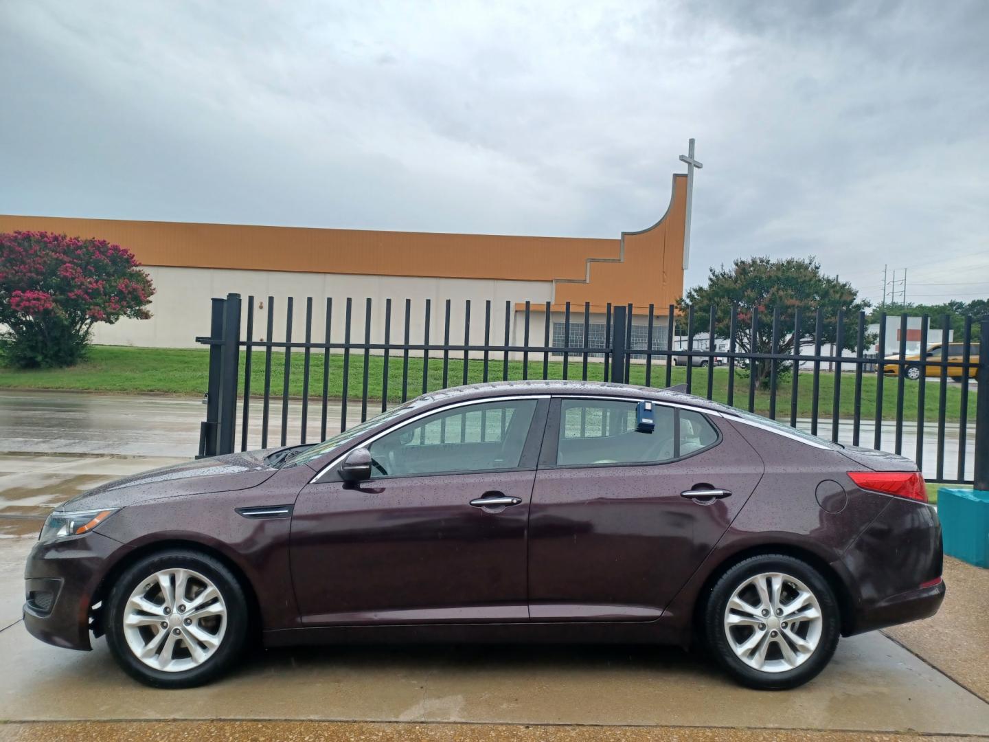 2013 MAROON Kia Optima LX MT (5XXGM4A72DG) with an 2.4L L4 DOHC 16V engine, 5-Speed Manual transmission, located at 2001 E. Lancaster, Ft. Worth, 76103, (817) 336-7000, 32.746181, -97.301018 - Photo#0