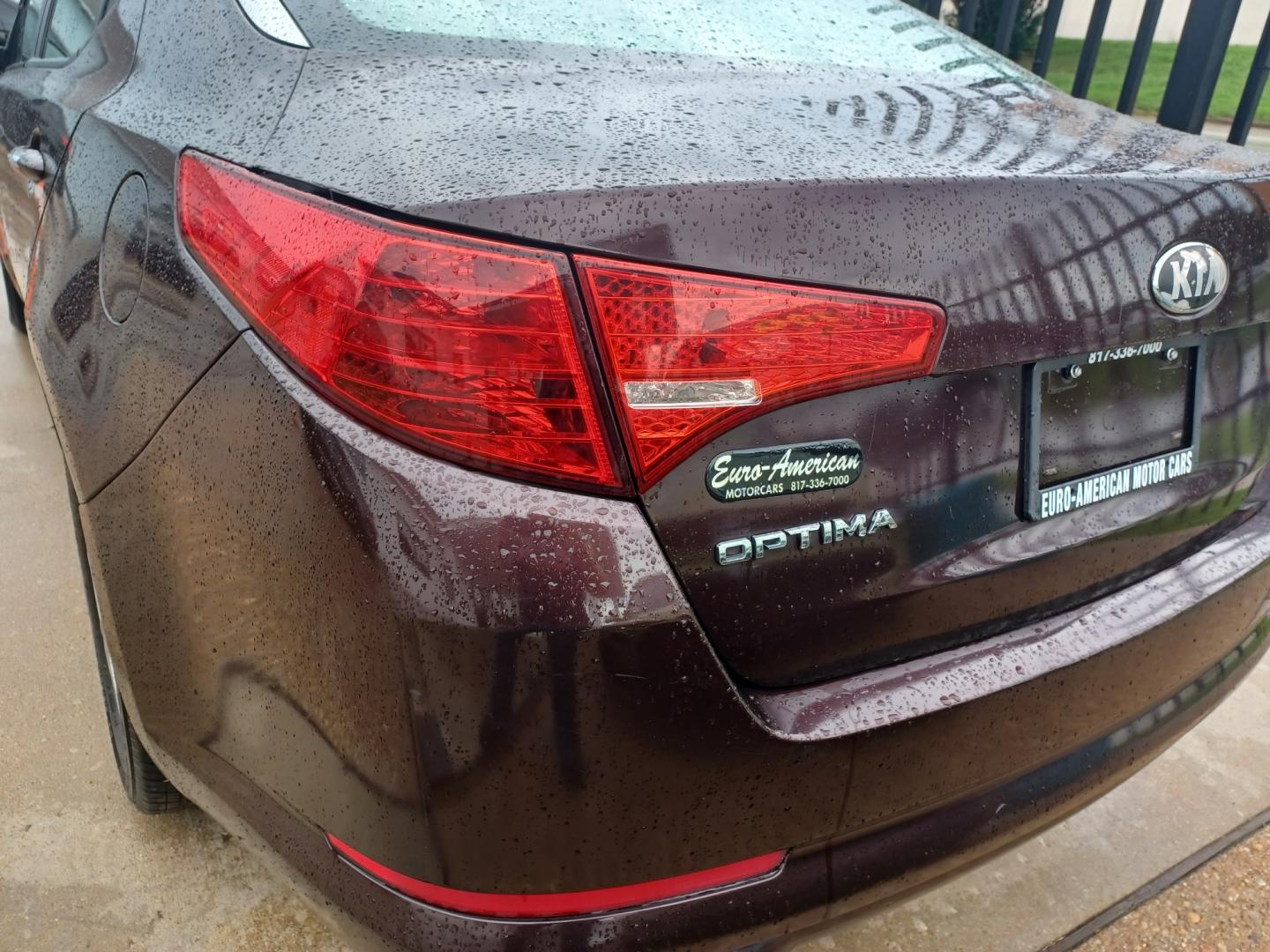 2013 MAROON Kia Optima LX MT (5XXGM4A72DG) with an 2.4L L4 DOHC 16V engine, 5-Speed Manual transmission, located at 2001 E. Lancaster, Ft. Worth, 76103, (817) 336-7000, 32.746181, -97.301018 - Photo#7