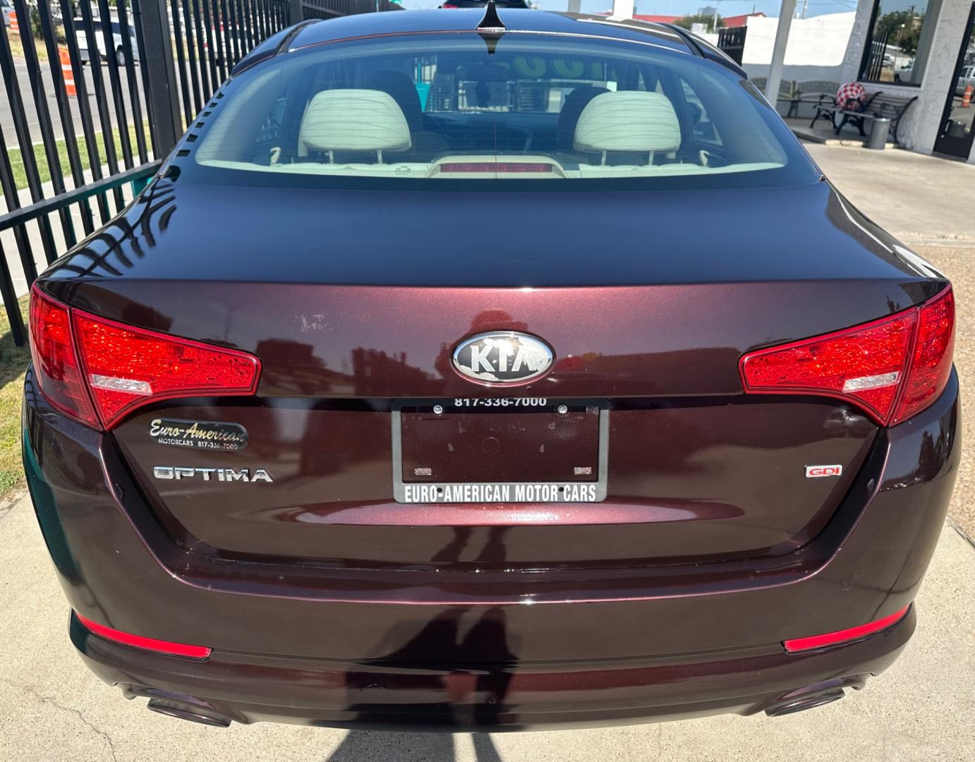 2013 MAROON Kia Optima LX MT (5XXGM4A72DG) with an 2.4L L4 DOHC 16V engine, 5-Speed Manual transmission, located at 2001 E. Lancaster, Ft. Worth, 76103, (817) 336-7000, 32.746181, -97.301018 - Photo#6