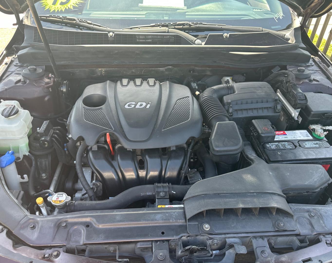 2013 MAROON Kia Optima LX MT (5XXGM4A72DG) with an 2.4L L4 DOHC 16V engine, 5-Speed Manual transmission, located at 2001 E. Lancaster, Ft. Worth, 76103, (817) 336-7000, 32.746181, -97.301018 - Photo#25
