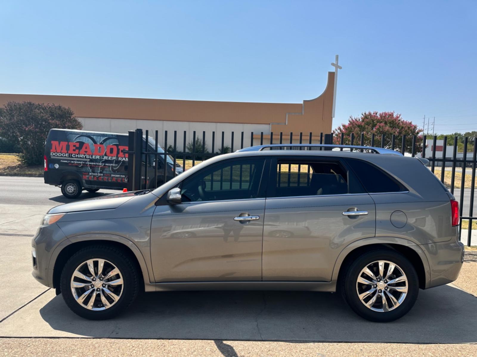 2011 BROWN Kia Sorento SX 2WD (5XYKW4A27BG) with an 3.5L V6 DOHC 24V engine, 6-Speed Automatic transmission, located at 2001 E. Lancaster, Ft. Worth, 76103, (817) 336-7000, 32.746181, -97.301018 - Photo #0