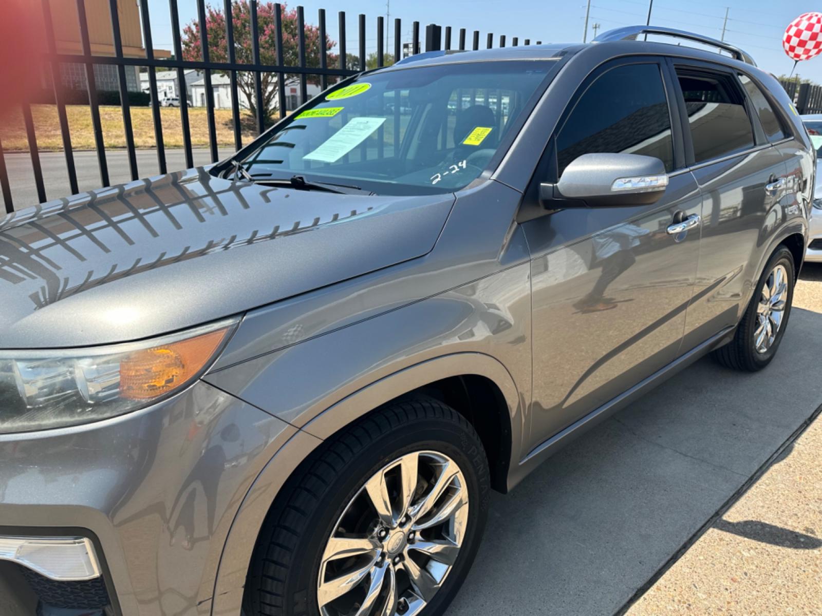 2011 BROWN Kia Sorento SX 2WD (5XYKW4A27BG) with an 3.5L V6 DOHC 24V engine, 6-Speed Automatic transmission, located at 2001 E. Lancaster, Ft. Worth, 76103, (817) 336-7000, 32.746181, -97.301018 - Photo #1